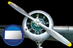 kansas map icon and an aircraft propeller
