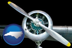 north-carolina map icon and an aircraft propeller