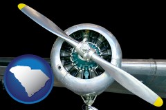 south-carolina map icon and an aircraft propeller