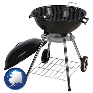 a kettle-style charcoal grill - with Alaska icon