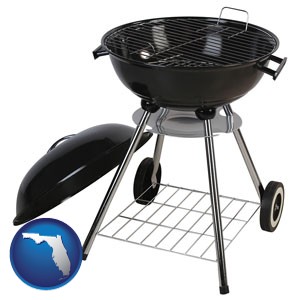 a kettle-style charcoal grill - with Florida icon