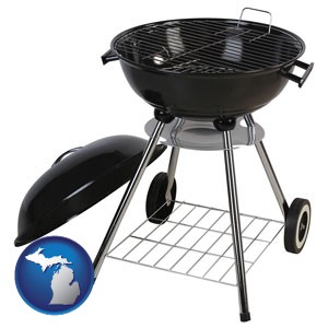 a kettle-style charcoal grill - with Michigan icon