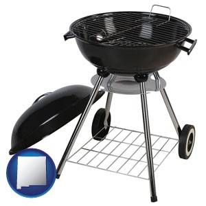 a kettle-style charcoal grill - with New Mexico icon