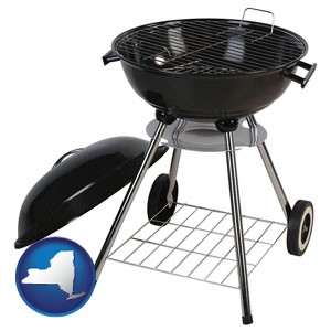 a kettle-style charcoal grill - with New York icon
