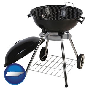a kettle-style charcoal grill - with Tennessee icon