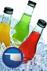 oklahoma map icon and beverage bottles on ice