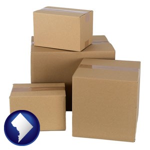a stack of cardboard boxes - with Washington, DC icon