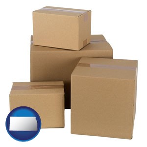 a stack of cardboard boxes - with Kansas icon