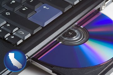 loading software into a laptop computer from a cd - with California icon