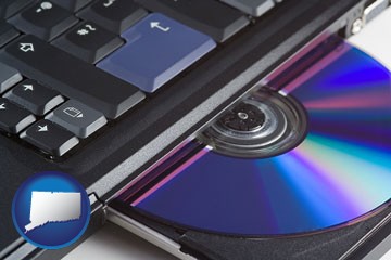 loading software into a laptop computer from a cd - with Connecticut icon