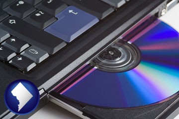 loading software into a laptop computer from a cd - with Washington, DC icon