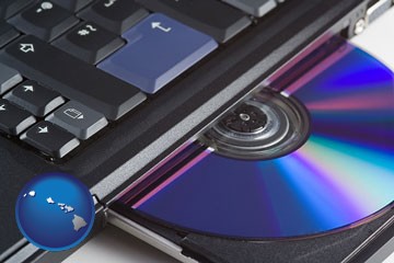 loading software into a laptop computer from a cd - with Hawaii icon