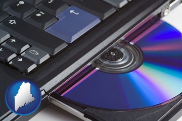 loading software into a laptop computer from a cd - with Maine icon