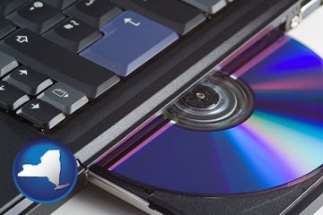 loading software into a laptop computer from a cd - with New York icon