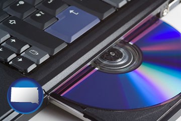 loading software into a laptop computer from a cd - with South Dakota icon