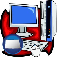 north-dakota map icon and a computer cpu, keyboard, monitor, and mouse