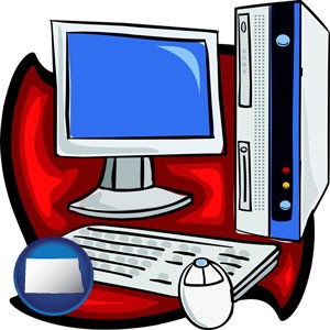 a computer cpu, keyboard, monitor, and mouse - with North Dakota icon