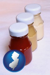 new-jersey map icon and ketchup, mustard, and mayonnaise condiments
