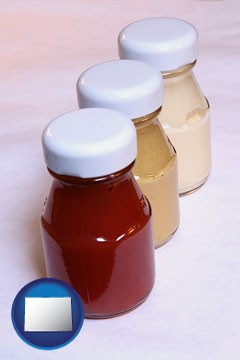 ketchup, mustard, and mayonnaise condiments - with Colorado icon