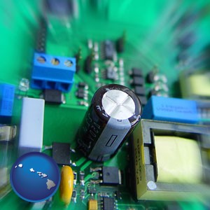 electronic components on a circuit board - with Hawaii icon