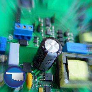 electronic components on a circuit board - with Oklahoma icon