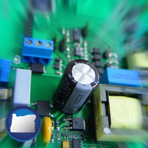 electronic components on a circuit board - with Oregon icon
