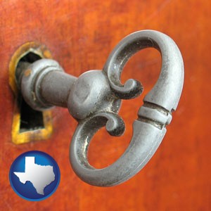 an antique furniture key - with Texas icon