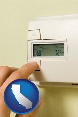 california map icon and a heating system thermostat