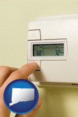connecticut map icon and a heating system thermostat