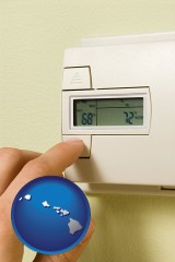 hawaii map icon and a heating system thermostat