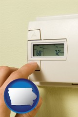 iowa map icon and a heating system thermostat