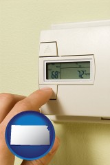 kansas map icon and a heating system thermostat