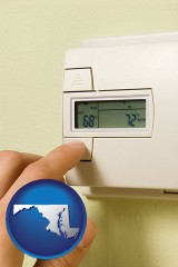 maryland map icon and a heating system thermostat