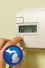 michigan map icon and a heating system thermostat