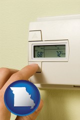 missouri map icon and a heating system thermostat