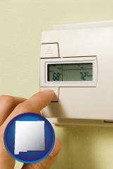 new-mexico map icon and a heating system thermostat
