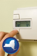 new-york map icon and a heating system thermostat