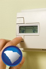 south-carolina map icon and a heating system thermostat