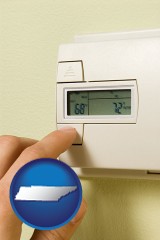 tennessee map icon and a heating system thermostat