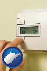 west-virginia map icon and a heating system thermostat