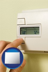 wyoming map icon and a heating system thermostat