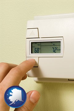 a heating system thermostat - with Alaska icon