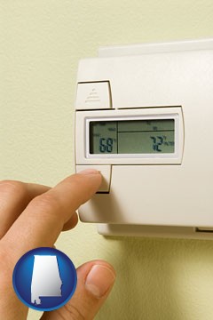 a heating system thermostat - with Alabama icon