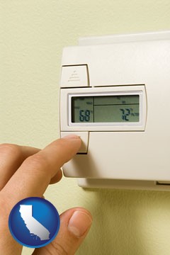 a heating system thermostat - with California icon