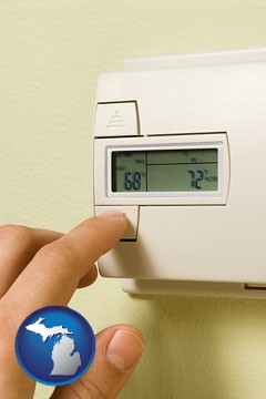 a heating system thermostat - with Michigan icon