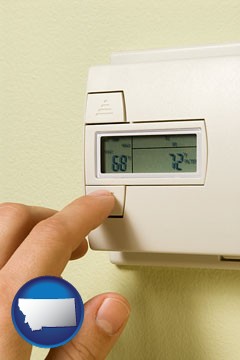 a heating system thermostat - with Montana icon