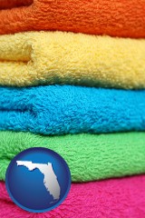 florida map icon and colorful bath towels