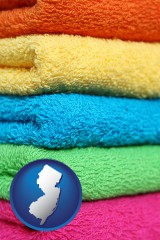 new-jersey map icon and colorful bath towels