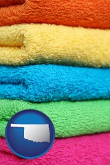 oklahoma map icon and colorful bath towels