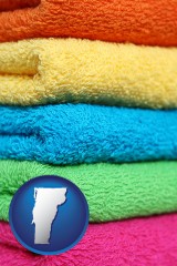 vermont map icon and colorful bath towels